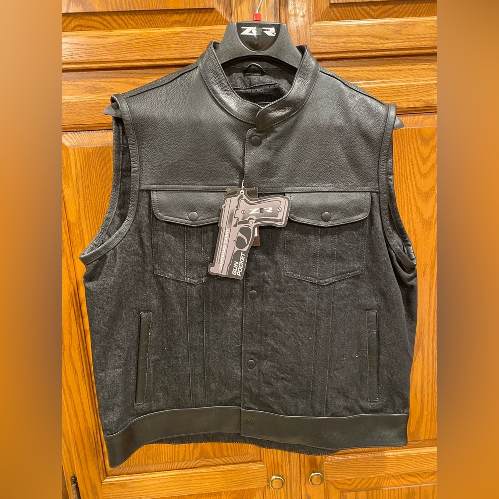 Black denim and leather vest, men’s large